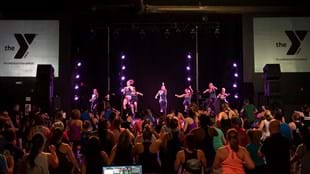 How to amaze members with a group fitness rock concert