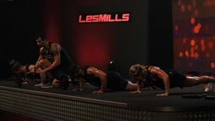 Amir coaches the BODYPUMP™ crowd through the shoulder track